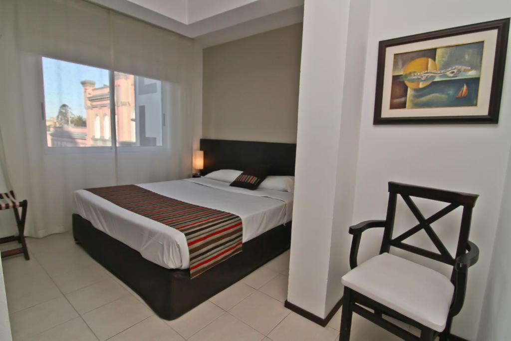 De la Plaza Hotel Maldonado Habitación foto