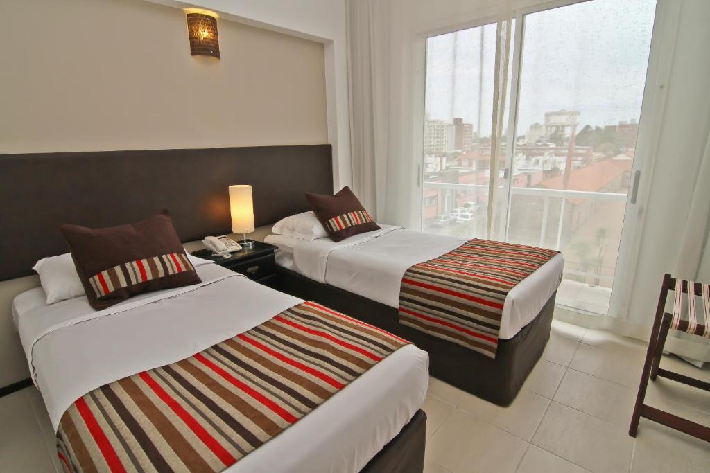 De la Plaza Hotel Maldonado Habitación foto