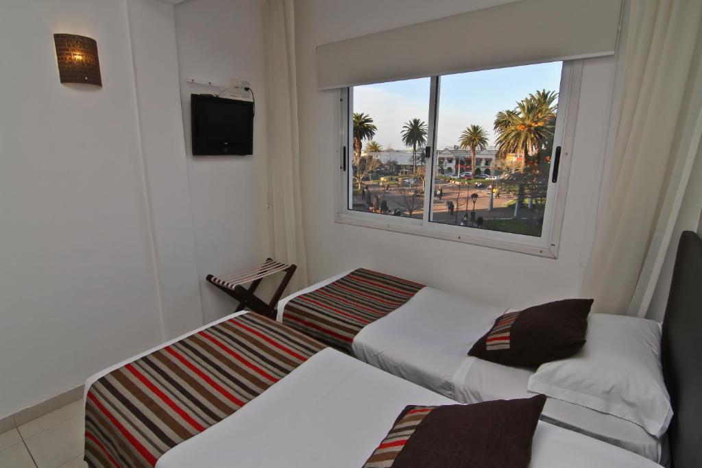 De la Plaza Hotel Maldonado Habitación foto